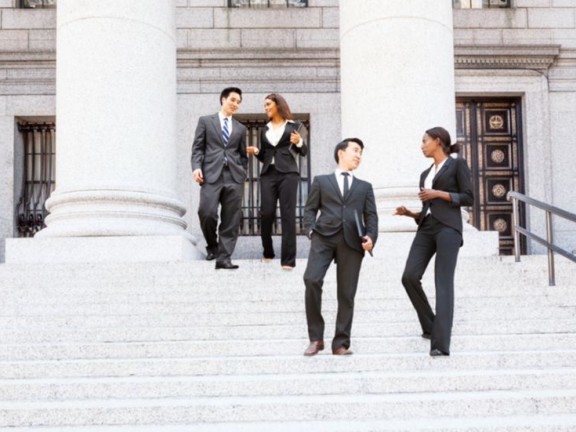 Stock photo professionally dressed people at government building