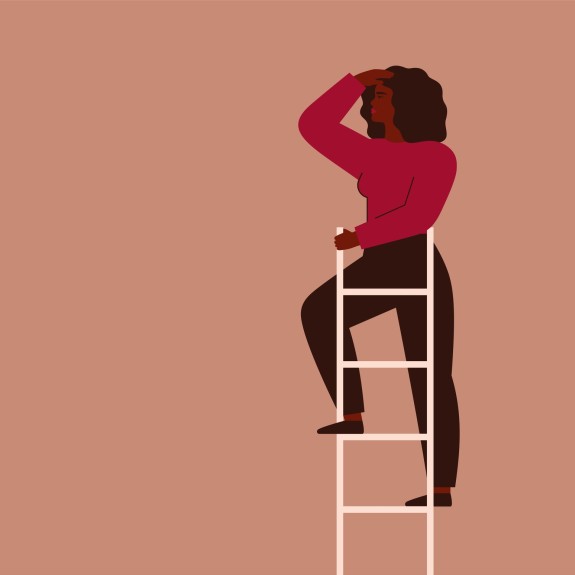 Woman of color climbing to the top of a ladder