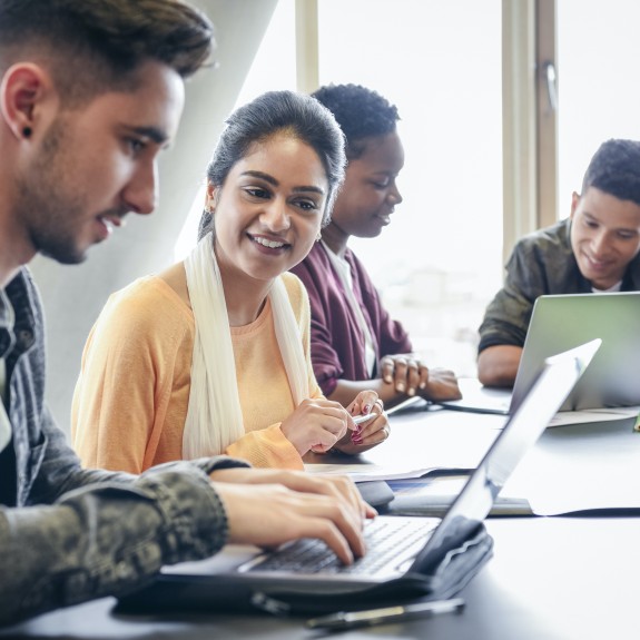 Students at computers Flipped