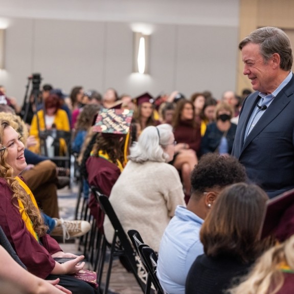 ASU President Michael Crow speaking with students