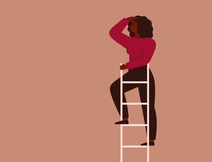 Woman of color climbing to the top of a ladder