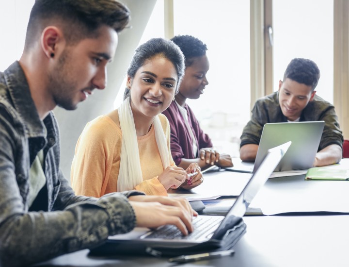 Students at computers Flipped