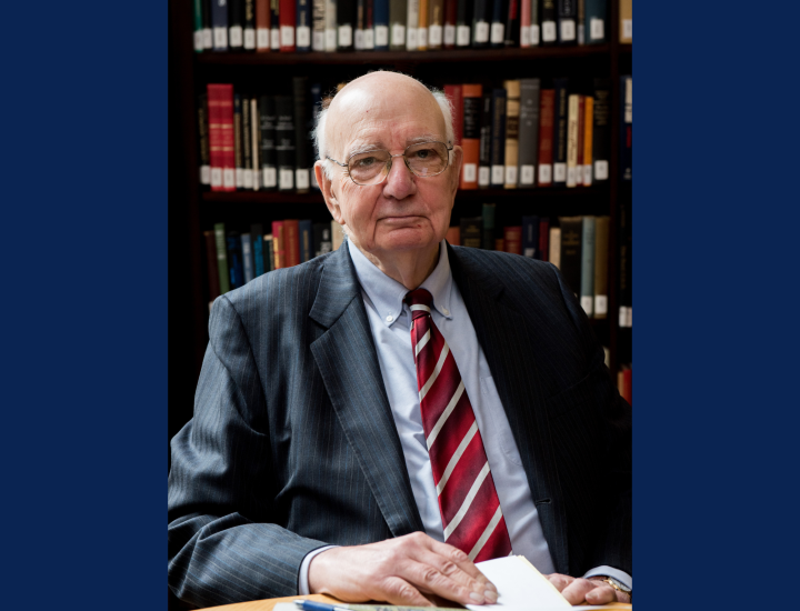 Paul A. Volcker headshot in library